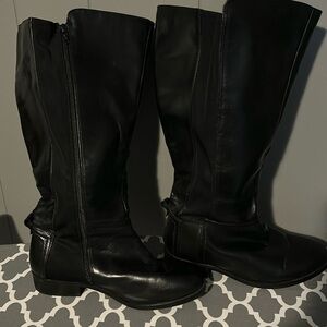 Tall black boots, Size 7 listed on bottom but fit size 10, wide calf, like new